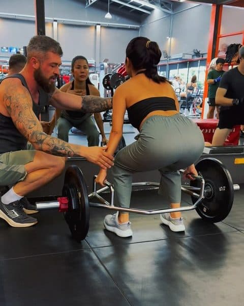 Rob coaching a deadlift in the gym