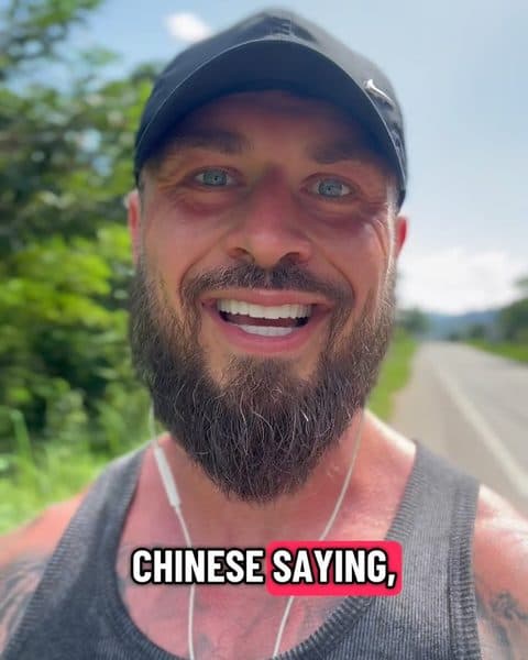 Rob smiling on a walk along a country road